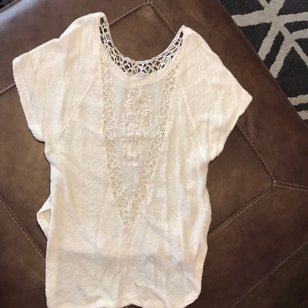 Cream colored lightweight crocheted top
